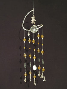 Baby theme suncatcher with gold faceted glass crystals and semi-precious natural Amber