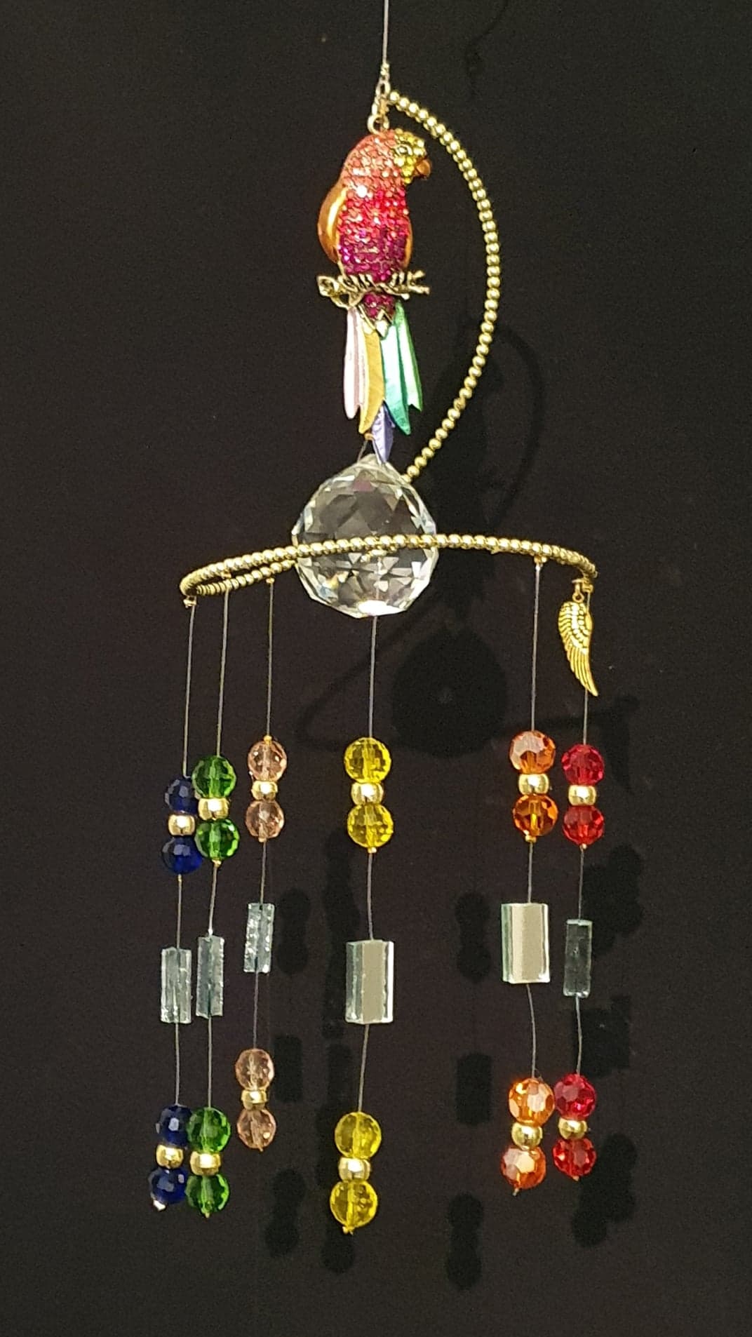 Parrot theme Rainbow / Chakra colour glass crystals. Gold beaded spiral suncatcher