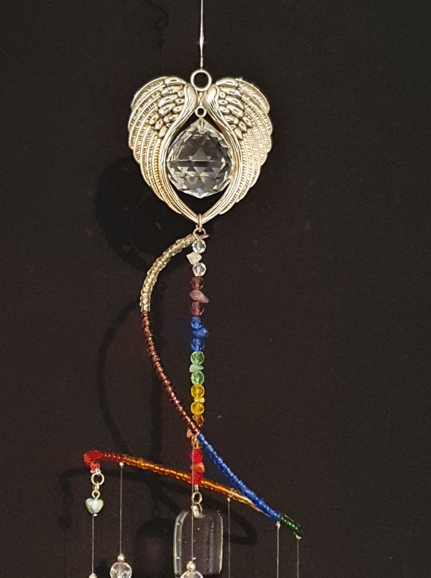 Beautiful Rainbow/Chakra theme spiral suncatcher with Angel Wing heart