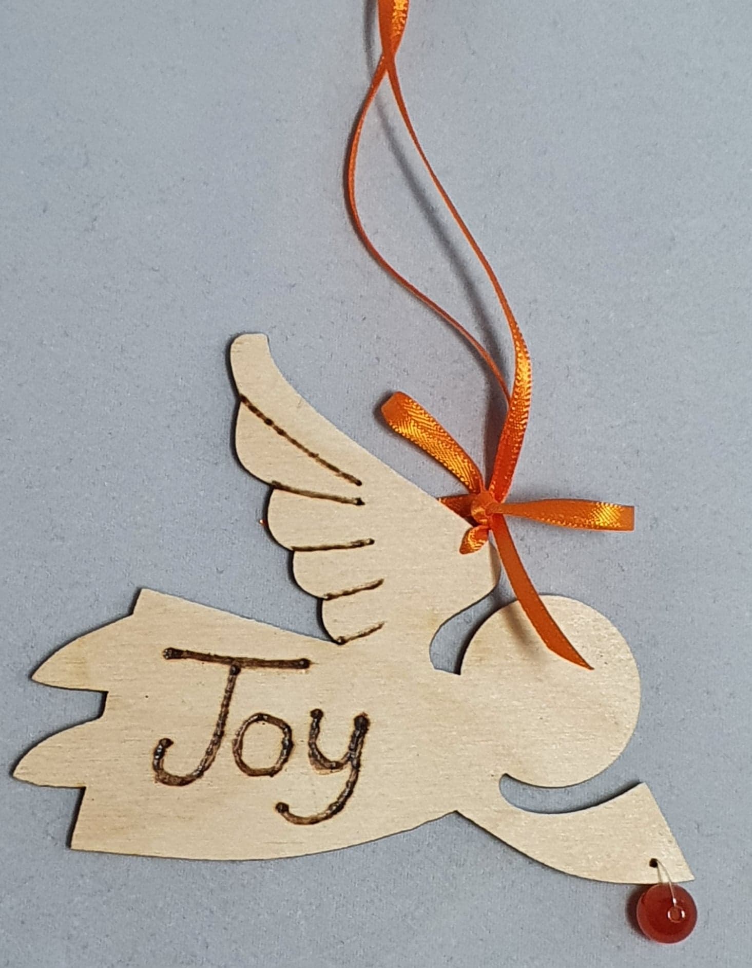 Rustic Charm Flying Angel with word "Joy" Carnelian
